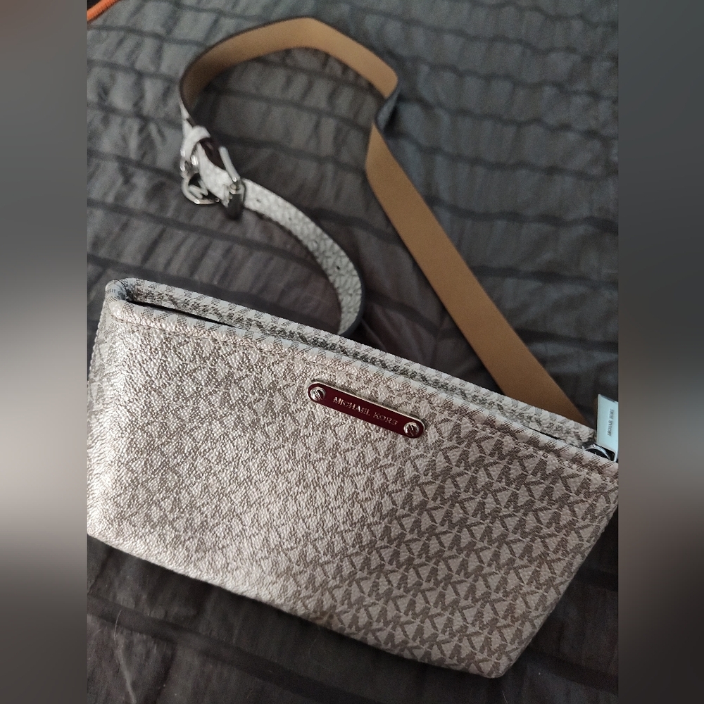 Michael Kors Gray Bag. Good Condition But Does Have a small Flaw(See Photo)